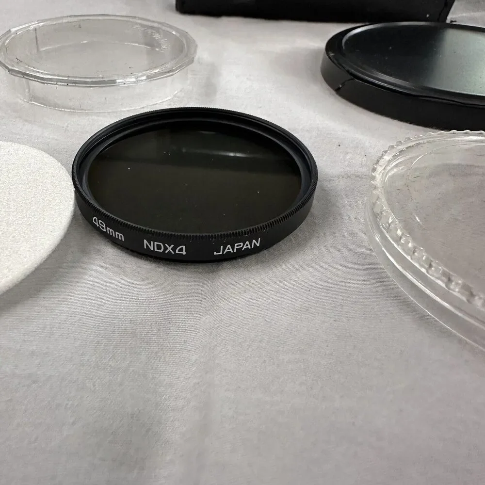 Panasonic Lens Adaptor Kit 49MM NDX4, Tele Conversion X1.5, Prism 5R 49MM